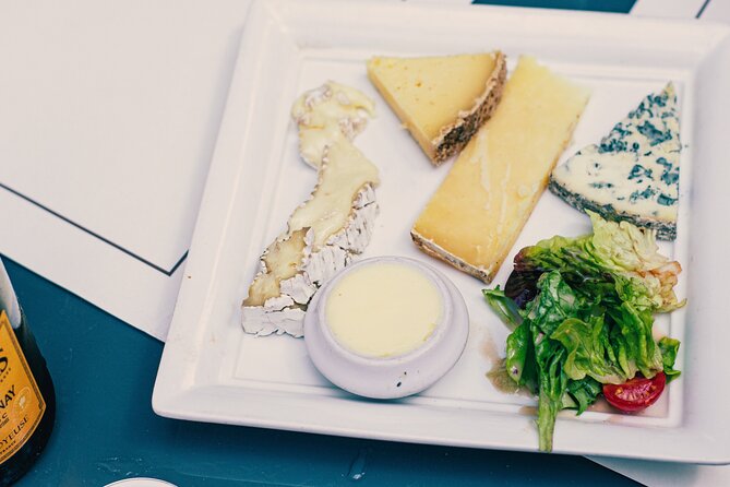 A Morning in Paris Food Tour: Croissants, Baguettes & Chocolate - Cheese, butter, and fruit jelly at the creamery