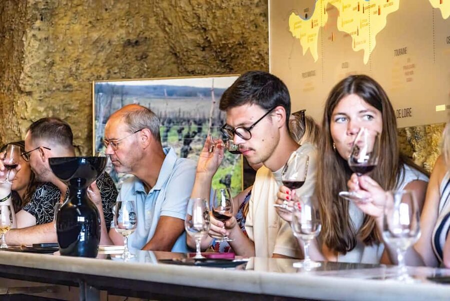 Amboise: Caves Ambacia Visit and Wine Tasting - The guides are a major part of the experience