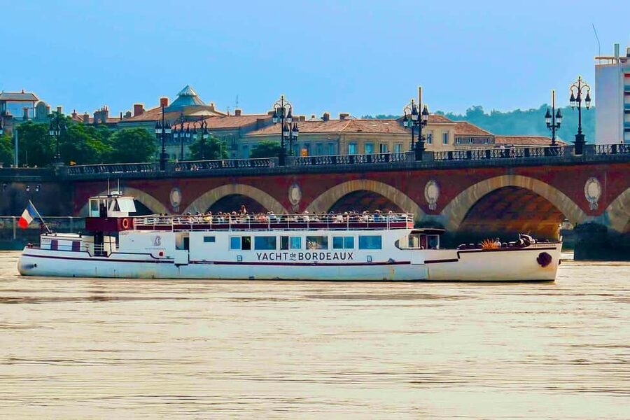 Bordeaux: River Garonne Cruise with Glass of Wine and Canelé - Pont de Pierre and Bordeaux’s riverfront story