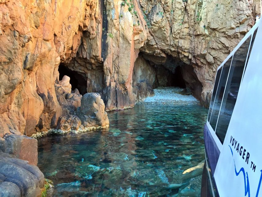 Cargèse: Scandola, Girolata, and Piana Afternoon Boat Tour - Capo Rosso, caves, arches, and a blue swimming pool