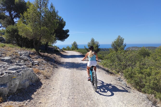 Cassis National Park E-Mountain Bike Experience with Virtual Guide - Port Miou and the choice of a swimming stop