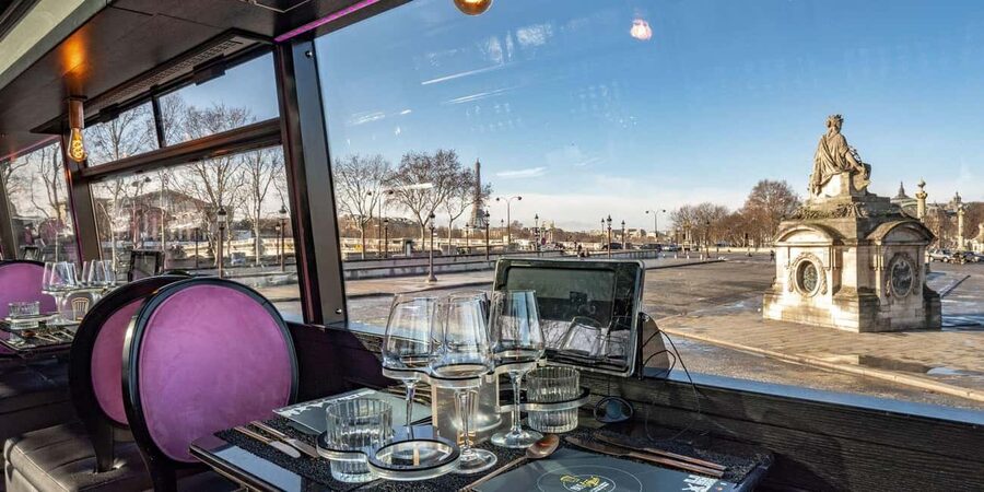 Champs Elysées Bus Toqué Lunch w/ a Glass of Champagne - Reading the Rive Gauche from the bus