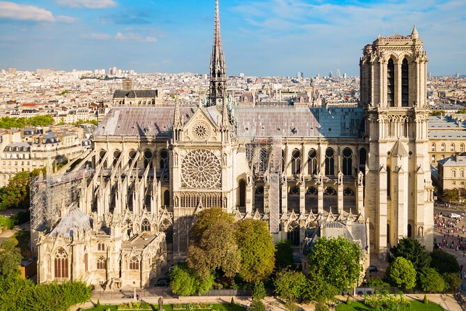 Early Access Paris Notre Dame Cathedral Walking Tour - The medieval clock tower and Pont Neuf finish