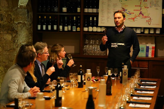 French Wine and Champagne Tasting in Paris - A French wine class in a Paris cellar