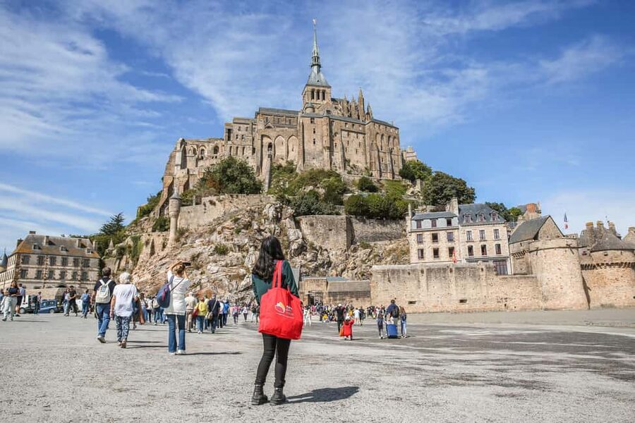 From Paris: Full-Day Mont Saint-Michel Guided Tour - The bridge, shuttle, and first view