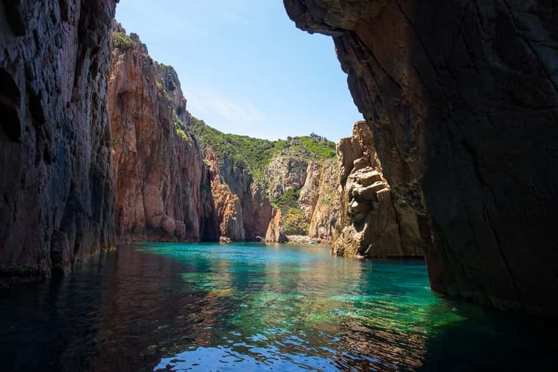 From Sagone/Cargèse: Piana, Scandola, Girolata Boat Tour - Omigna Genoese Tower and the first coastal views
