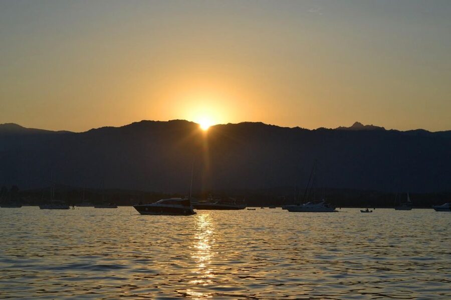 From Santa Giulia SUNSET Cruise & Apéritif - Weather can decide the evening