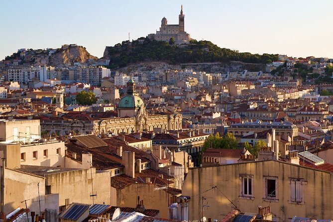 Guided Tour in Marseille: Vieux Port & Old City - Starting beneath the Old Port canopy
