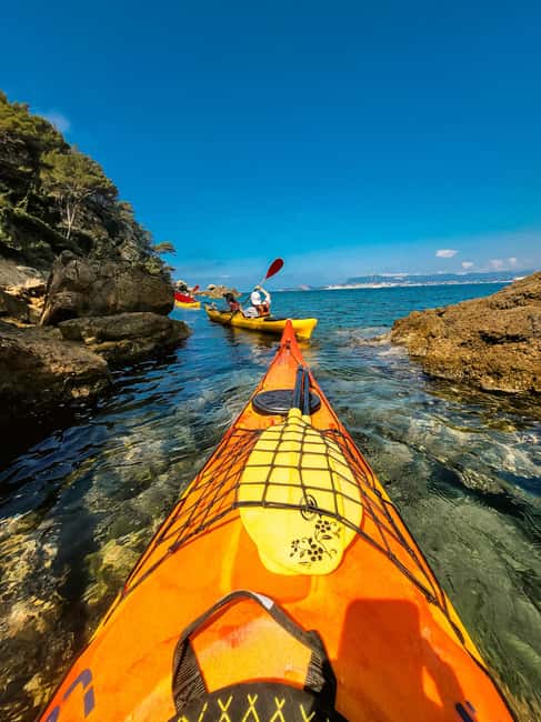 La Ciotat: Calanques National Park Guided Kayak Tour - Calanque du Mugel and the First Coastal Break