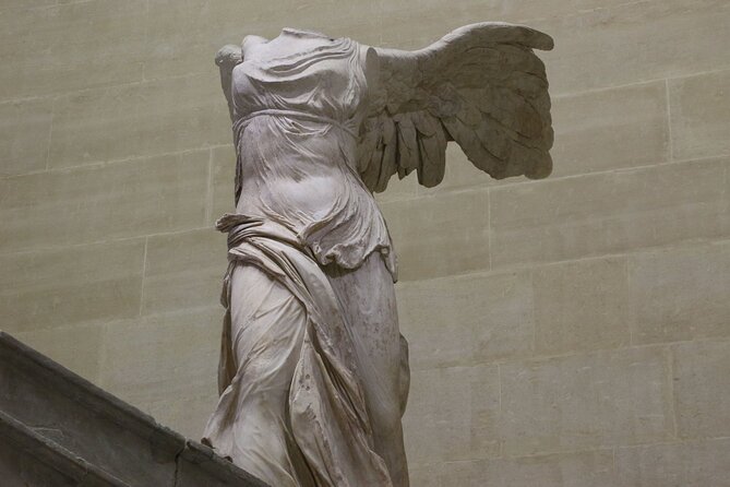 Louvre Museum Access Guided Tour with Mona Lisa - Palace rooms and unexpected details