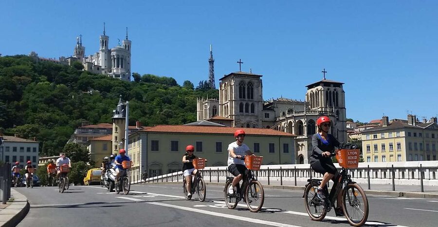 Lyon: 2-Hour Electric Bike Tour with a Local Guide - Place Bellecour and Lyons central scale