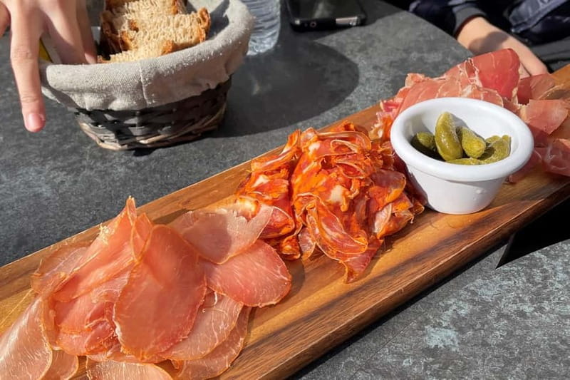 Lyon: Guided Food Tour with Tastings - Praluline, charcuterie, and the taste of traditional Lyon