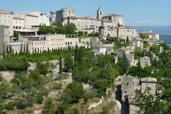 Market & Perched Villages of the Luberon Day Trip from Marseille - Roussillon brings color and market energy