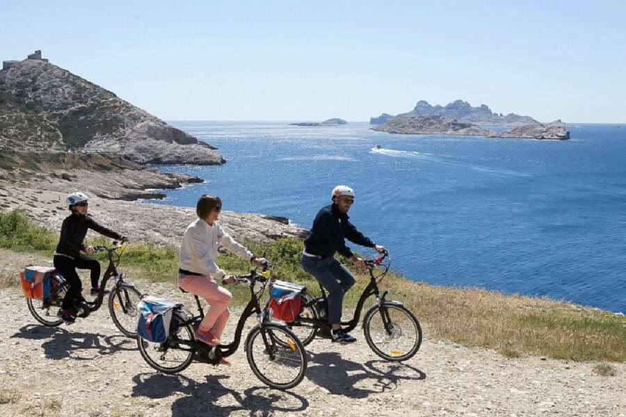 Marseille: Full-Day Guided E-Bike Coast & Calanques Tour - The Corniche and Prado Beach shift the ride toward the sea