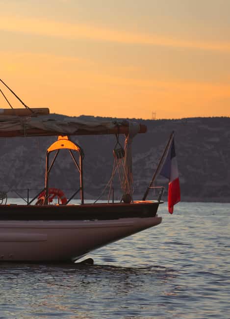 Marseille: Sunset Cruise Cocktail-Dinner in Frioul Islands - Leaving Marseille from the Old Port