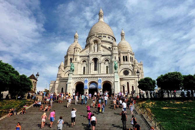 Montmartre Hidden Gems and Scenic Highlights Walking Tour - A man through a wall and Dalida’s Montmartre
