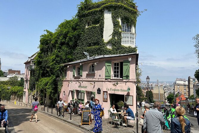 Montmartre Hill French Gourmet Food and Wine Tasting Walking Tour - Place du Tertre and the old village atmosphere