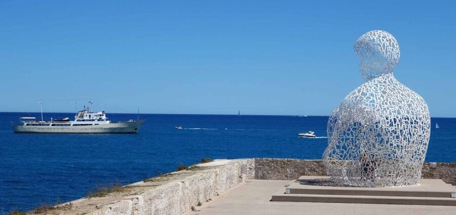 Nice: Cannes, Antibes & St Paul de Vence Half-Day Tour - Antibes harbor, yachts, and the old town