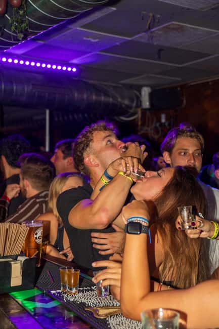 Nice: Party Bar Crawl with Club VIP, 6 Shots, and Games - Games, a mascot, and a camera in the crowd