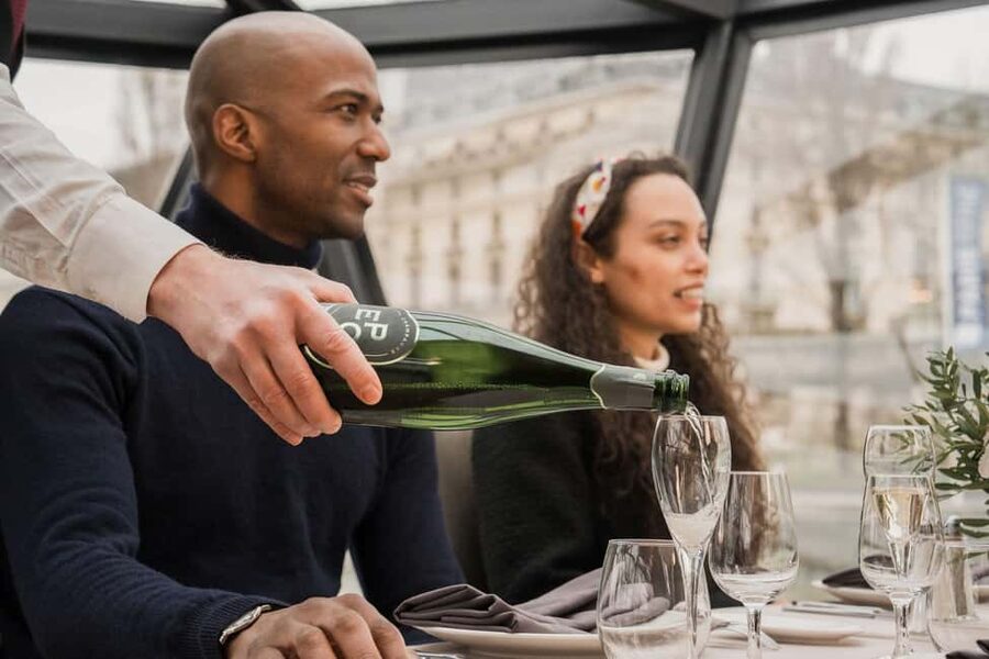 Paris: 4-Course Dinner Cruise on Seine River with Live Music - Four Courses, Wine, and a French Evening Meal