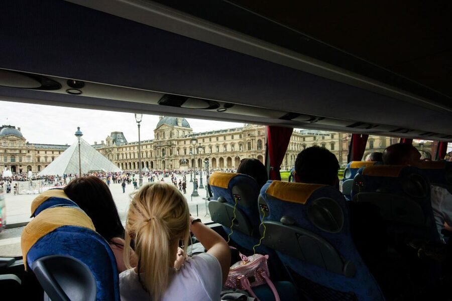 Paris: Audio-Guided Bus Tour & Seine River Cruise - The Seine cruise from the Eiffel Tower
