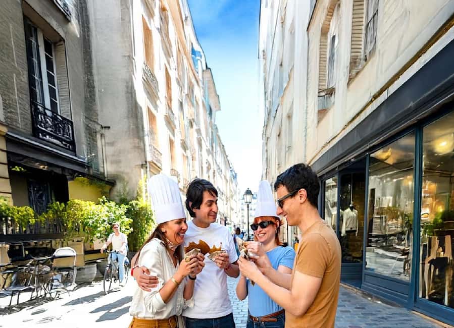 Paris: Authentic Food & Wine Tasting Tour in Le Marais - Cheese, confiture, and wine at the covered market
