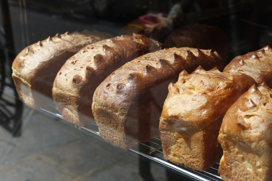 Paris: Behind the Scenes Bakery Tour with Breakfast - Shaping the baguette and other baked goods