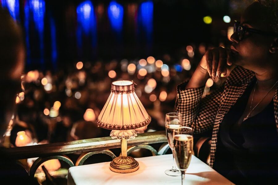 Paris: Champagne at the Moulin Rouge & Seine River Cruise - Choosing your seat and preparing for the theater