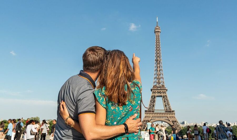 Paris: Eiffel Tower Tickets and City Bus Tour - Taking the elevator to the Eiffel Tower