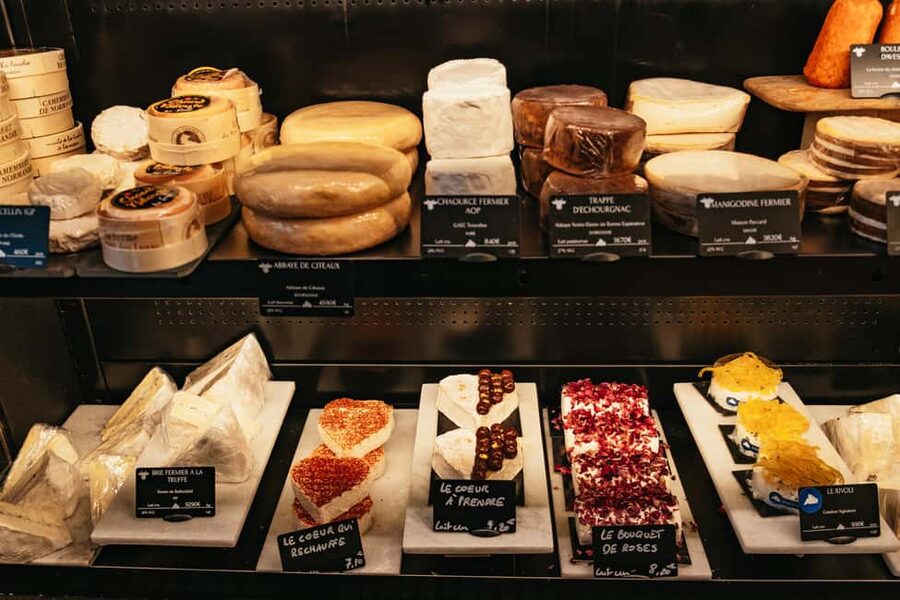 Paris: Gourmet Food Tour with Over 10 Tastings and Wine - A seated break with French wine and charcuterie