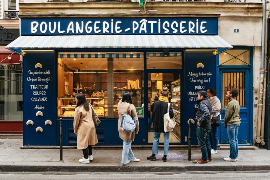 Paris: Gourmet Food Tour with Over 10 Tastings and Wine - Starting with croissants and the everyday jambon beurre