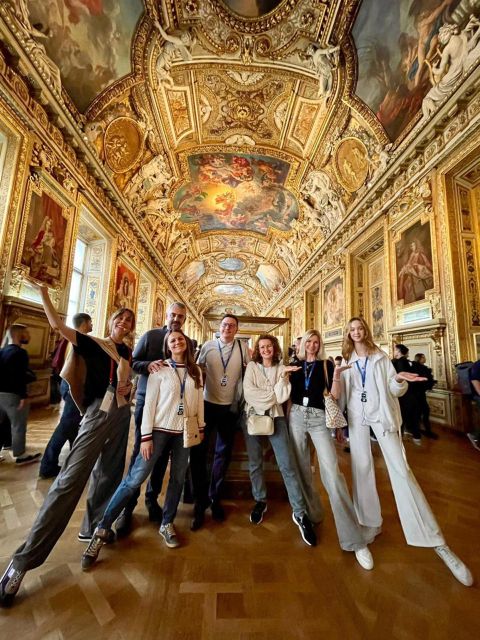 Paris: Guided Louvre Museum Tour with Optional Entry Ticket - Greek sculpture at the grand staircase