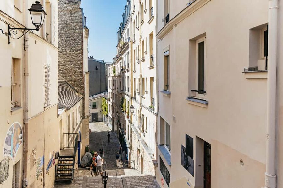 Paris: Hidden Gems of Montmartre with Local Guide - The vineyard and a quieter view of Sacré-Coeur