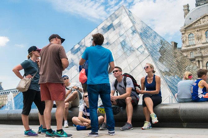 Paris Highlights Bike Tour: Eiffel Tower, Louvre and Notre-Dame - Rue Cler gives the ride a local pause