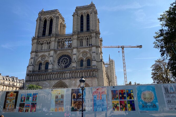 Paris Île de la Cité and Notre-Dame Walking Tour With Crypt - The medieval clock tower and royal power