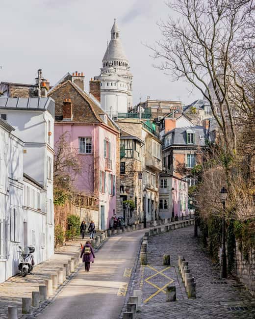 Paris: Montmartre Hidden Gems and Highlights Walking Tour - The Moulin de la Galette and the artists of Montmartre