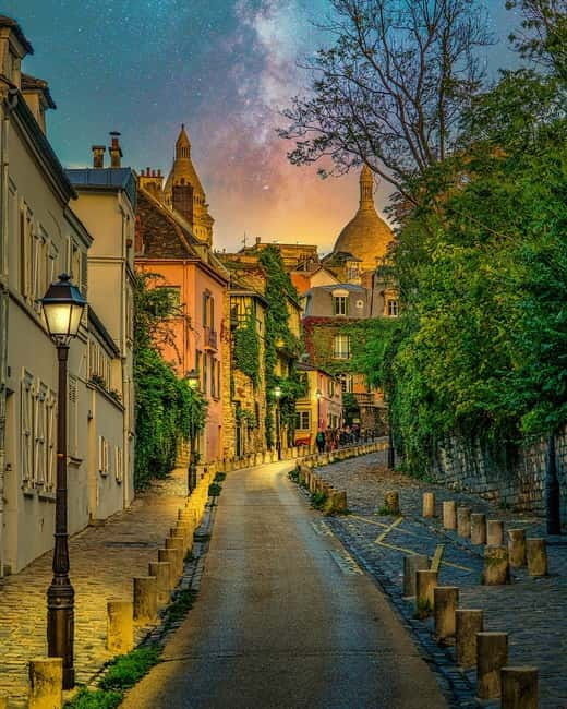 Paris: Montmartre Highlights Walking Tour with a Local Guide - Moulin de la Galette and the painted Montmartre