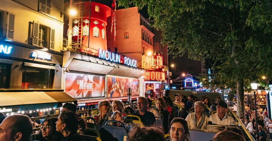 Paris: Night Bus Tour with Audioguide - Moulin Rouge and Opera show a different Paris