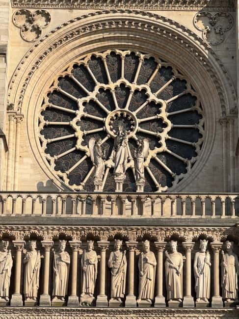 Paris: Notre-Dame Cathedral Exterior Guided Tour - Meeting the guide beside the Charlemagne statue