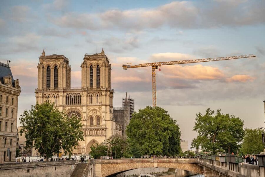Paris: Notre Dame Outside Tour and Sainte Chapelle Ticket - Place Dauphine and the quieter side of Paris