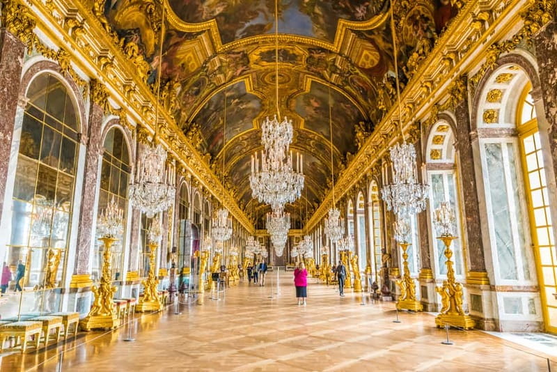 Paris: Palace of Versailles Guided Tour with Bus Transfers - Inside the palace: two hours of royal excess