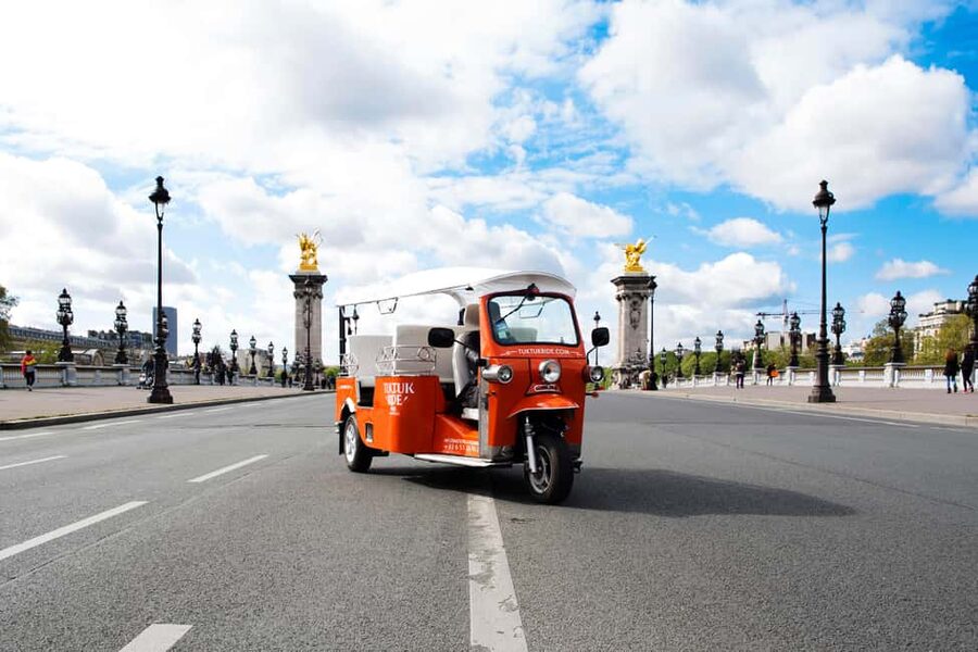 Paris: Private City Highlight Tour by Electric Tuk-Tuk - Weather, comfort, and the ride itself
