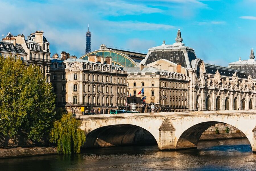 Paris: Romantic Cruise with 3-course Dinner on Seine River - Paris at night from a slow-moving Seine boat