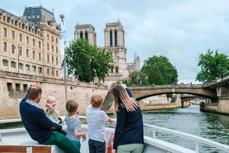 Paris: Seine River Cruise with a Live Guide - A quiet electric ride beneath Parisian bridges