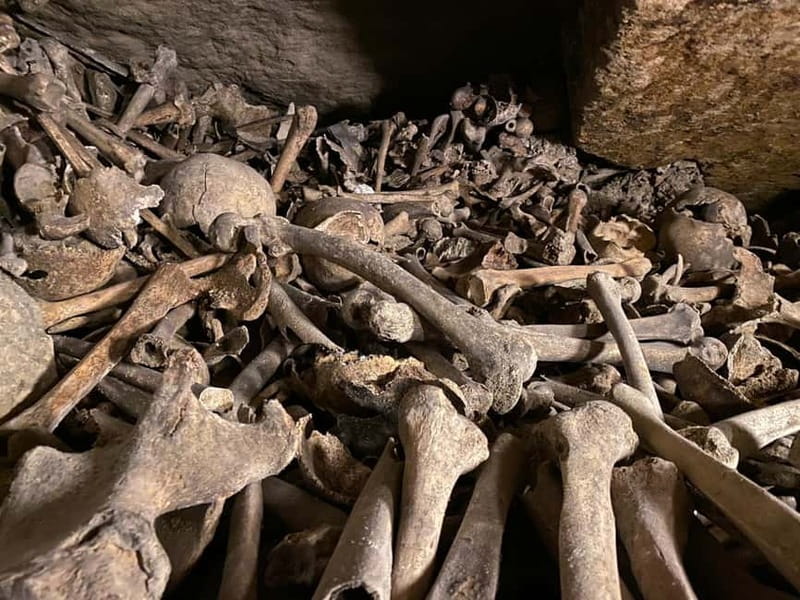 Paris: Small-Group Catacombs Tour with Skip-the-Line Entry - Bone arrangements in the Crypt of the Passion