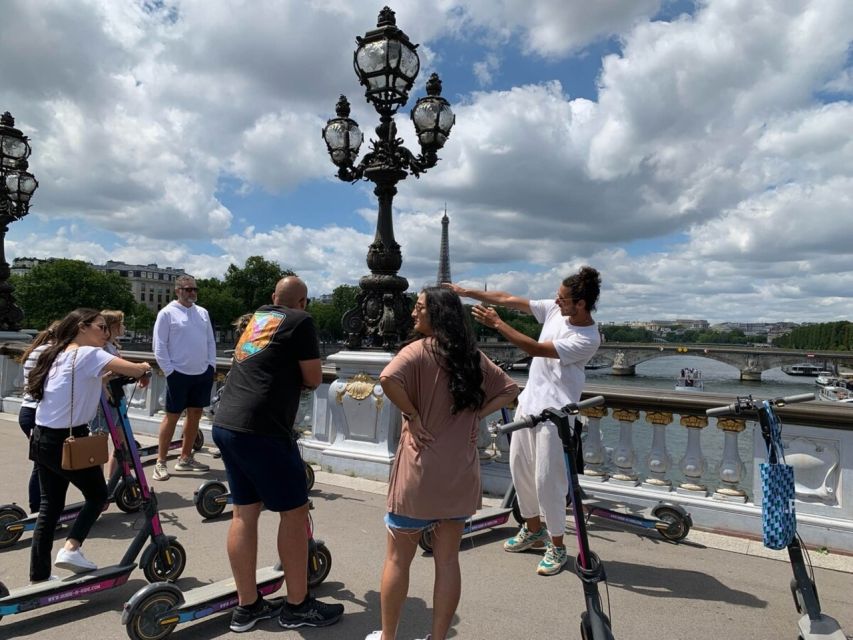 Paris: Small-Group E-Scooter Tour with a Local Guide - The Louvre courtyard and pyramid