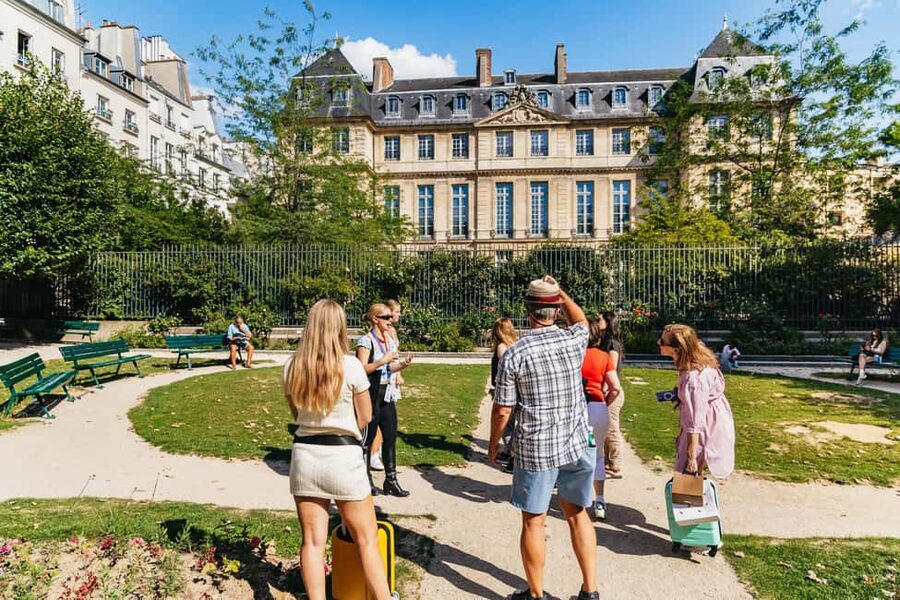 Paris: Walking Food Tour with Cheese, Wine and Delicacies - Cheese, baguette, and wine in the French tradition