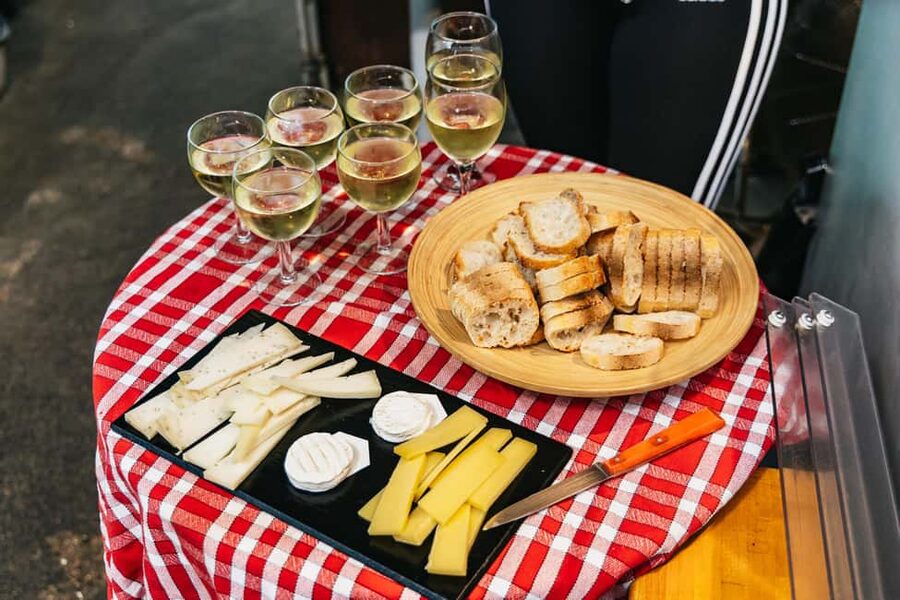 Paris: Walking Food Tour with Cheese, Wine and Delicacies - A traditional market and the local side of the neighborhood
