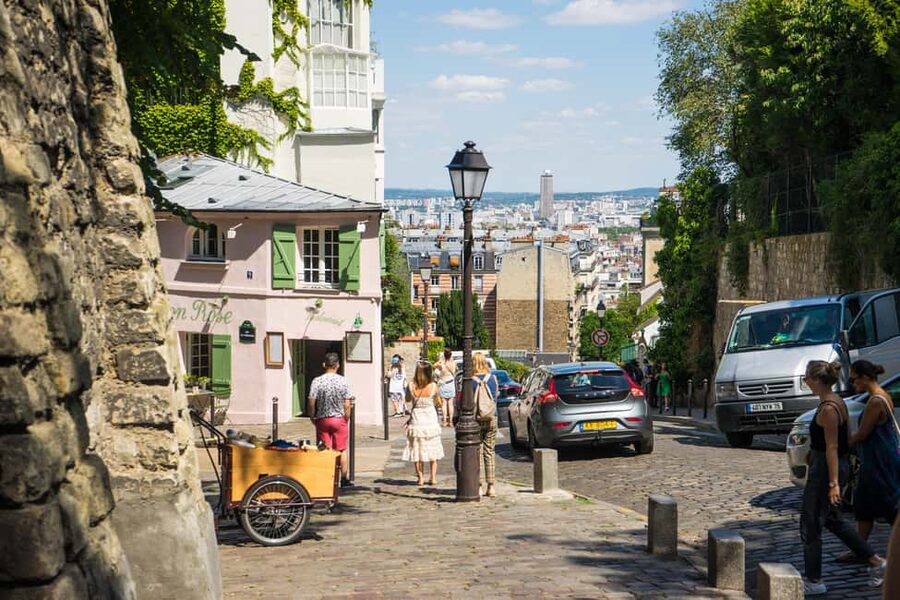 Paris: Walking Tour of Montmartre - Place du Tertre, where art meets tourist traffic