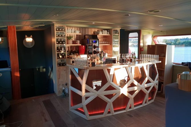 Prestige Commented Cruise glass of wine and Canelé in Bordeaux - Matmut Atlantic Stadium from the water
